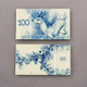 Illustration for article titled Gorgeous Banknotes Feature Flora, Fauna—And Skeletons Under UV Light